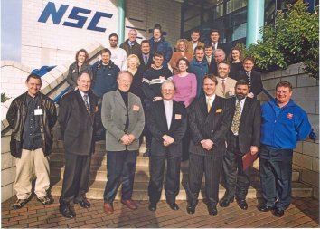 The media and the organising committee outside the NSC